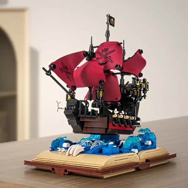 Lego bateau pirate voiles rouges sur livre – Image 2
