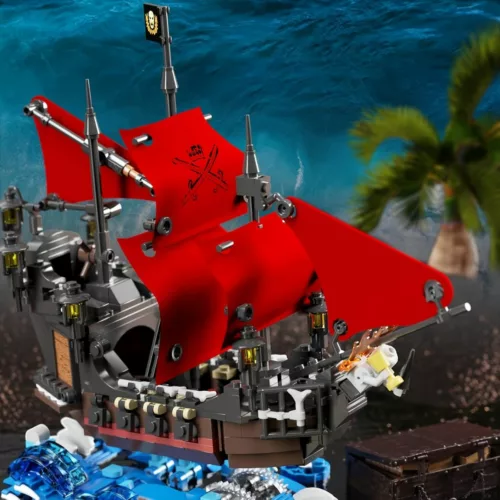 Lego bateau pirate voiles rouges sur livre