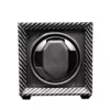 Remontoir montre design carbone compact